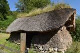 a reconstruction of a thatched roof house a Scottish herdsmen would have used in past centuries